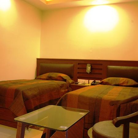 Hotel Avn Grand Ранчи Стая снимка
