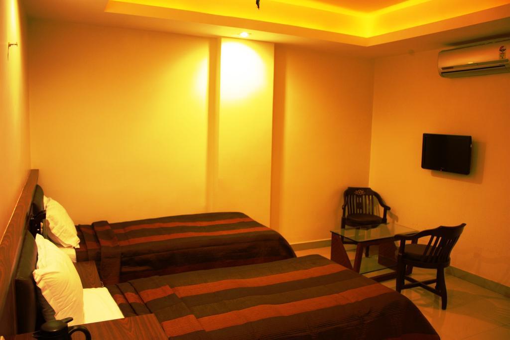 Hotel Avn Grand Ранчи Стая снимка